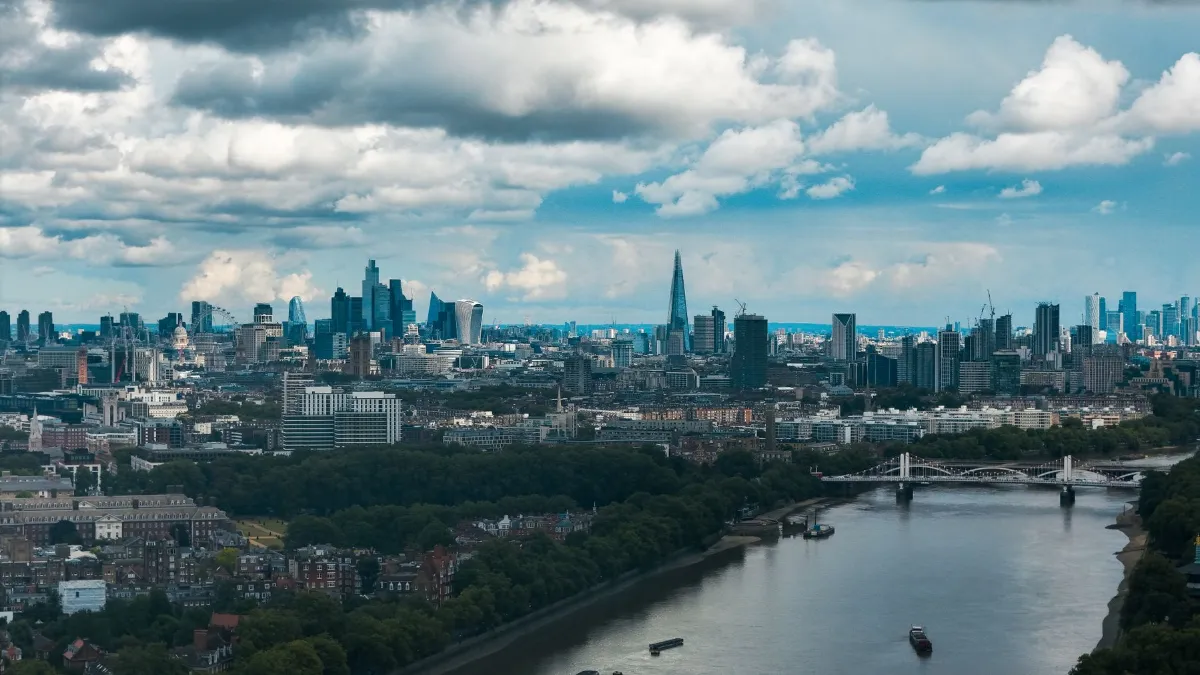 Aerial view of the London skyline and the River Thames on a cloudy day